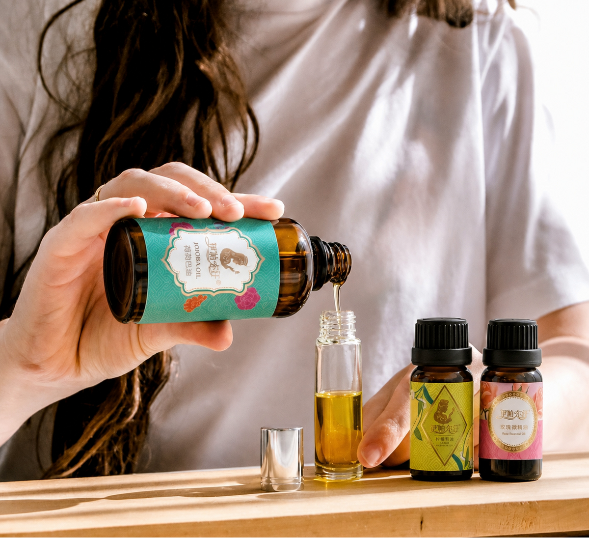 EPRHAN essential oils being blended with a glass dropper bottle in a natural aromatherapy skincare routine
